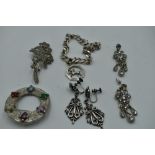 A small selection of white metal jewellery including a curb link bracelet and charm stamped 925/