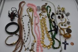 A selection of costume jewellery including earrings, bracelets and beads etc