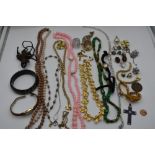 A selection of costume jewellery including earrings, bracelets and beads etc