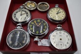 A selection of top wound pocket watches in base metal cases and a cased compass