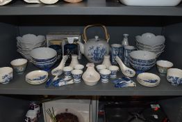 A mixed lot containing various oriental style table items, including tea pot, bowls and more, also