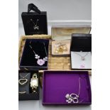 A small selection of costume jewellery including watch set, diamante necklaces etc