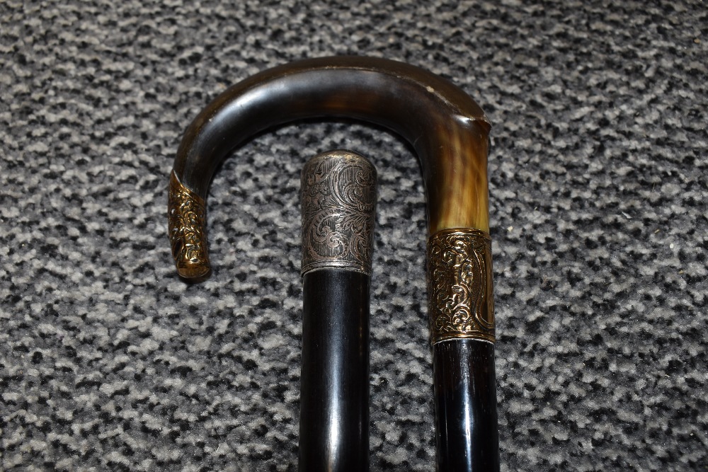 Two vintage canes/ swagger stick one having gold tone monogrammed plate to neck and embossed end - Image 2 of 2