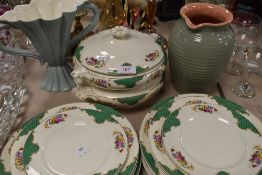 A good quantity of vintage Booths plates having green motifs and floral pattern on cream ground,