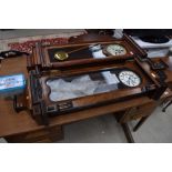 A 19th Century Vienna style wall clock having enamelled dials , pendulum and weights present