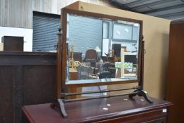 An early 20th Century mahogany toilet mirror in classical design with part turned frame, width