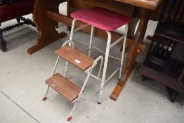a set of vintage metal and wooden fold away steps