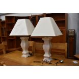 A pair of modern oversized table lamps (one having crack to one side)