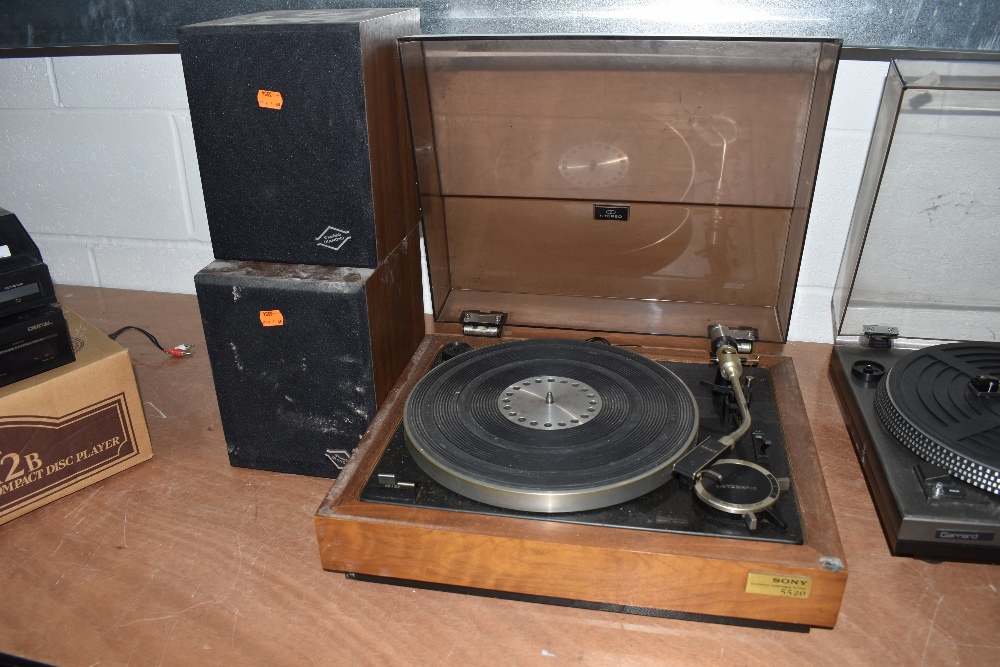 A Sony 5520 vinyl record player with Warfedale Diamond speakers