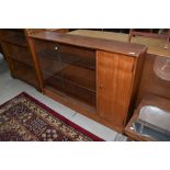 A mid century teak display cabinet, approx. dimensions W122cm H83cm D25cm