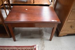 A modern mahogany occasional/coffee table, approx. 26 x 41cm