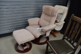 Two easy recliner chairs and matching foot stools