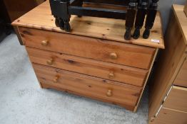 A modern part pine low bedroom chest of three drawers, width approx. 84cm