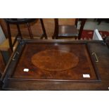 A butlers dinner tray having brass handle and quarter panel inlay