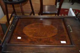 A butlers dinner tray having brass handle and quarter panel inlay