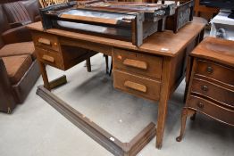 A vintage oak office desk, approx. 138 x 76cm