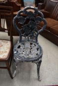 A cast aluminium garden chair