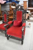 A late Victorian Carolean style solid oak carver chair of impressive proportions having Black Forest