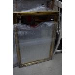 A reproduction gilt framed mirror, approx. 87 x 60cm