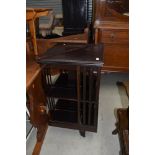 An early 20th Century mahogany revolving book case