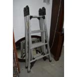 A set of fold out aluminium step ladders