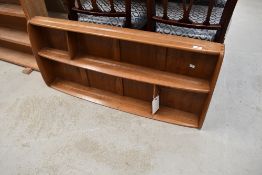A mid stain Ercol plate shelf, approx. 107 x 50cm