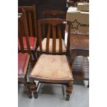 Two arch backed dining chairs
