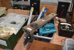 A selection of tools including Makita plasterboard driver