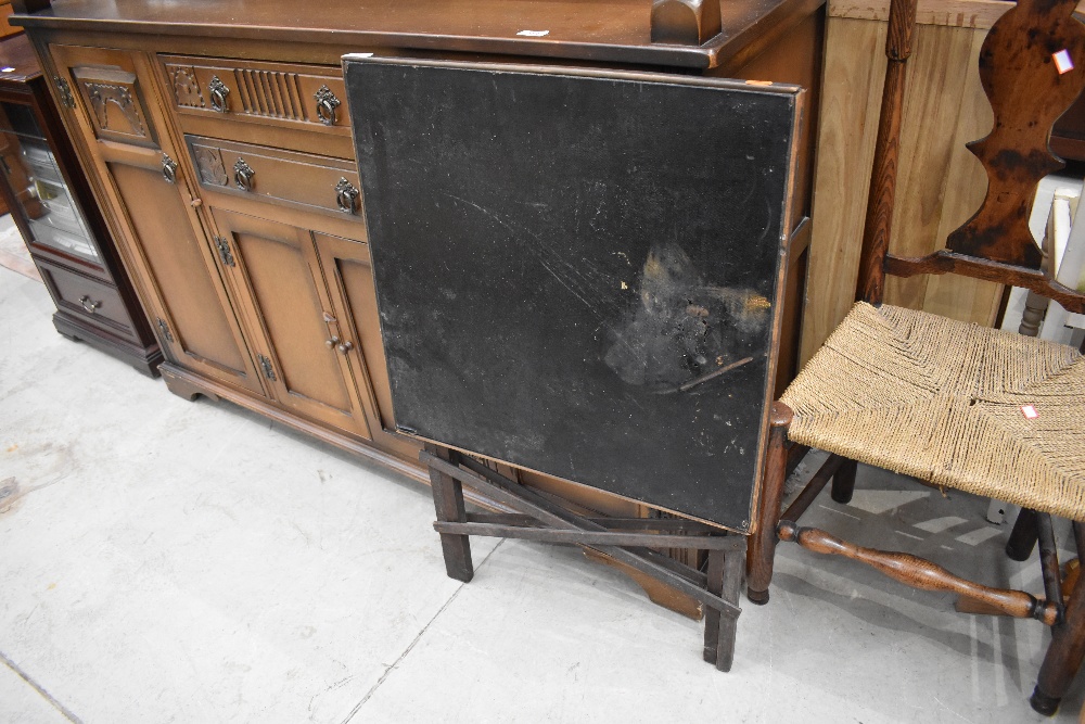 An antique folding card table, top badly damaged, approx 56 x 56cm