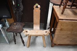 A stripped Gothic style three legged stool/knitting chair