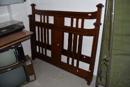 An Edwardian mahogany and inlaid double bed ends (no frame)