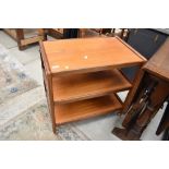 A mid century teak tea trolley, G plan or similar design