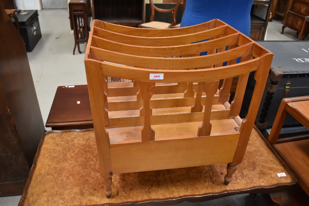 A modern pine wood canterbury style magazine rack