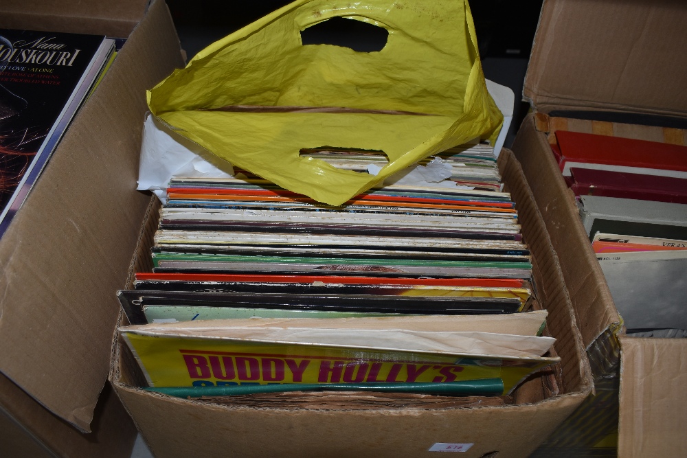 A selection of vinyl records mostly rock and pop interest