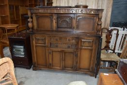 A mid to late 20th Century Priory style court cupboard, width approx. 140cm