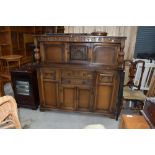 A mid to late 20th Century Priory style court cupboard, width approx. 140cm