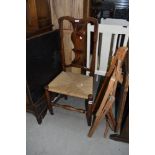 A period oak and elm vase back chair having later strung seagrass style seat