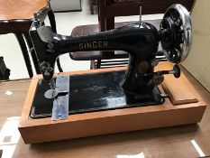 A hand cranked Singer sewing machine with case P199346