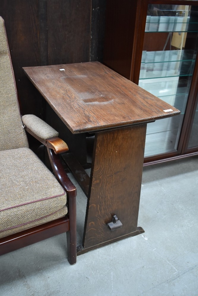An early 20th Century oak Arts and Crafts style side table, approx. 76 x 45cm