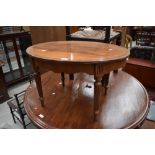 A reproduction mahogany Adams style oval coffee table, width approx. 69cm