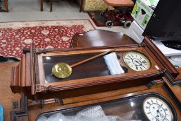 A 19th Century Vienna style wall clock having enamelled dial and labelled Waterbury clock Co. ,