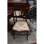 An Edwardian mahogany and inlaid bedroom chair