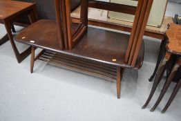 A mid century dark stained low coffee table by Ercol, approx dimensions 104cm x 45cm