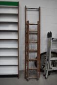 A set of wooden extending ladders