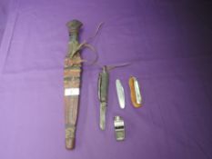 A vintage Tribal Knife with leather scabbard, total length 36cm, a Military Pen Knife with pick,