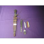 A vintage Tribal Knife with leather scabbard, total length 36cm, a Military Pen Knife with pick,