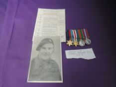 A group of four WW2 miniature medals, 39-45 Star, France Germany Star, War Medal and Defence Medal