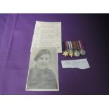 A group of four WW2 miniature medals, 39-45 Star, France Germany Star, War Medal and Defence Medal