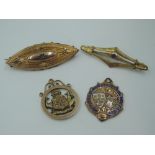 A small selection of 9ct gold and yellow metal including Cumberland football medal, bar brooches,