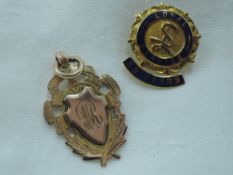 A 9ct gold long service pin and medalion, approx 10g